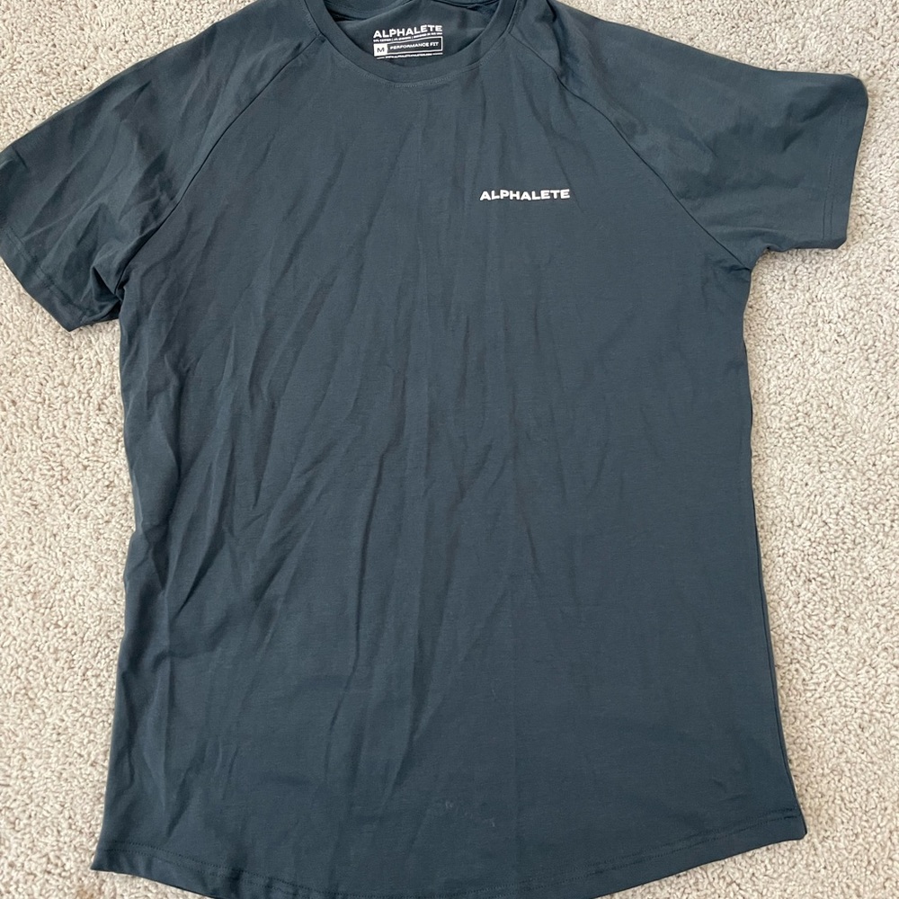 Men's alphalete tee. Never worn. Wrinkled from being in drawer